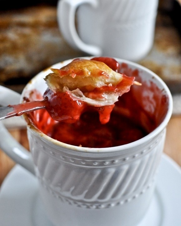Make this strawberry pie in a mug in the microwave or get fancy and use the oven. Photo and recipe from howsweeteats.com
