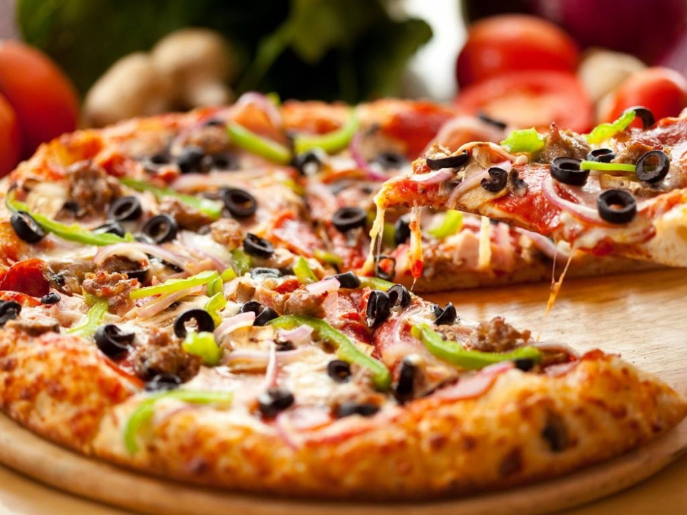 November 12: National Pizza With Everything Day (Except Anchovies)