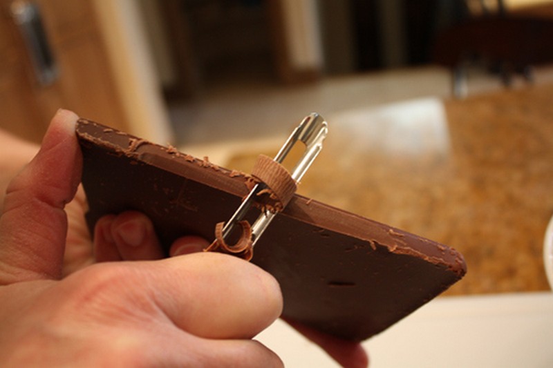 Use a potato peeler to make chocolate peels for garnishes